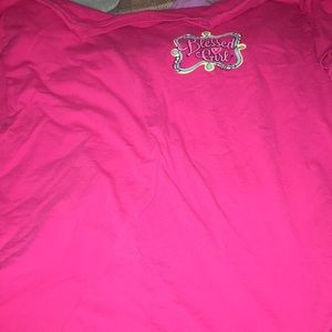 Pink shirt with a cross
